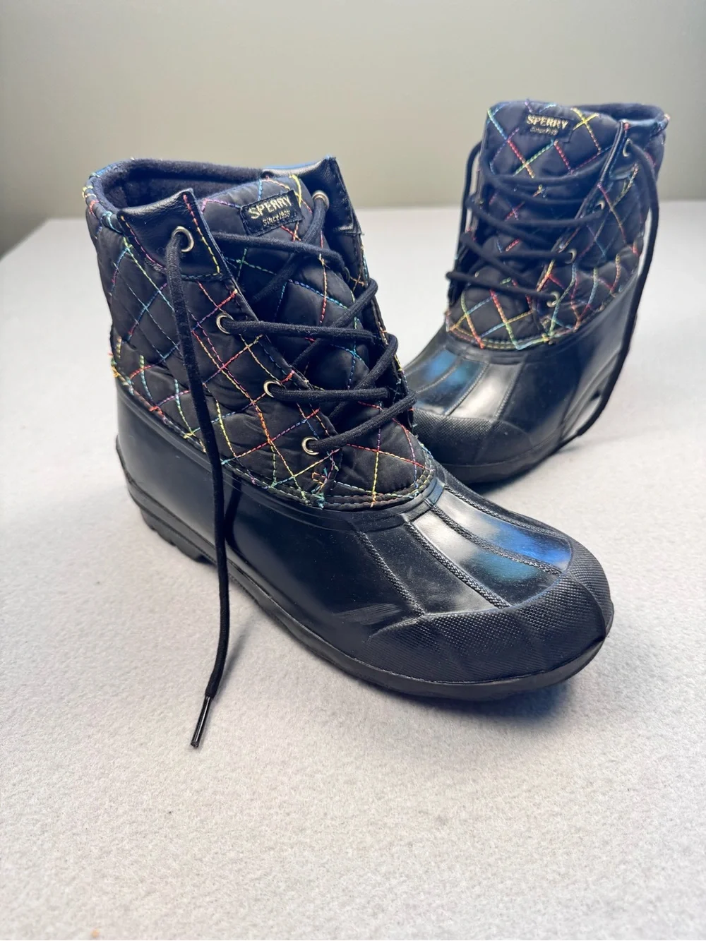Sperry Black Quilted Lace-Up Rain Boots with Rainbow Stitching